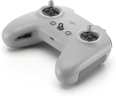 Vista lateral del Control remoto 3 DJI FPV con diseño compacto y controles para pilotaje de drones